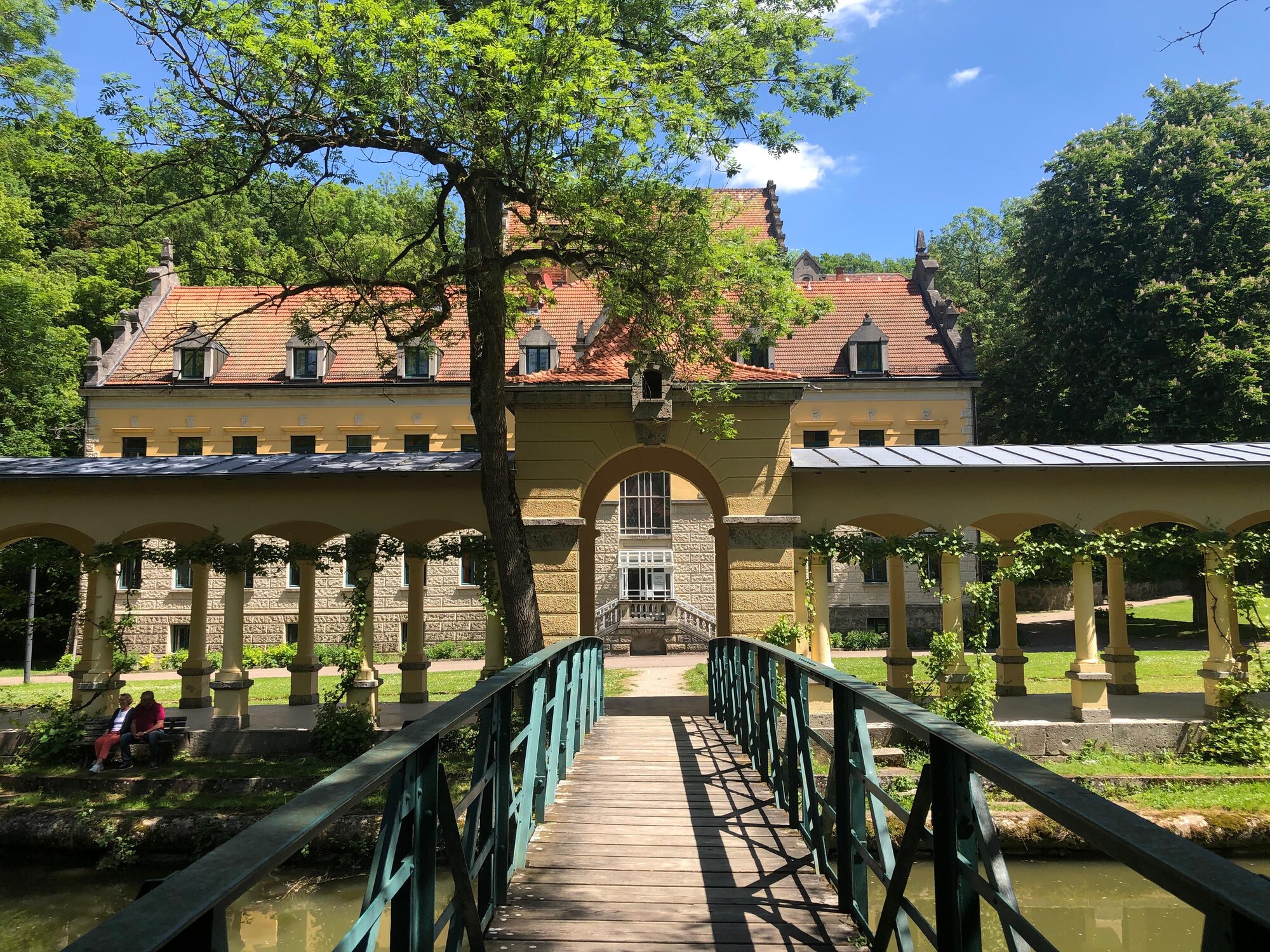 Wildbad Rothenburg with its colonnades and the footbridge over the Tauber